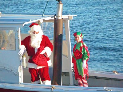 Sailing Santa
After arriving in Marion via boat at Island Wharf, Santa Claus greeted the crowd awaiting him before participating in the town's 2006 Annual Holiday Village Stroll. (Photo by Robert Chiarito).
