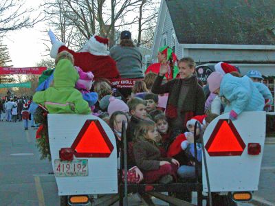 Santa's Sleigh
Happy children ride along with Santa Claus on a carriage drawn by the Clydesdale horses during the 2006 Marion Village Holiday Stroll which took place on Sunday, December 10. (Photo by Robert Chiarito).
