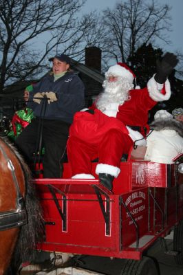 Santa's Sleigh
Without snow, Santa opted to travel via horse-drawn carriage through town during Marion's Annual Christmas Village Stroll held on Sunday, December 9, 2007. (Photo by Robert Chiarito).
