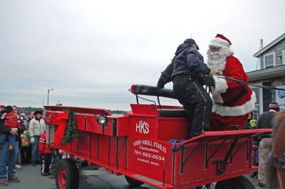 Marion Christmas Stroll 2007
Santa climbs aboard a horse-drawn carriage during Marion's Annual Christmas Village Stroll held on Sunday, December 9, 2007. (Photo by Robert Chiarito).
