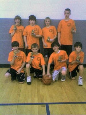 Orange Crush Opponents
Members of the championship Syracuse Orangemen team of the Mattapoisett Recreation Department's Boys Basketball League include (front, l. to r.) Zack Rivera, Andrew Dessert, Aaron Rivera, Casey Mackenzie, (back, l. to r.) Thomas Lavoie, Casey Silvera, Chris Tippins, Jared Reuter. Not pictured: Casey Bono, Coaches Rob Reuter and Chris Dessert. The team finished the season with a 13-1 record and a 13 game winning streak.
