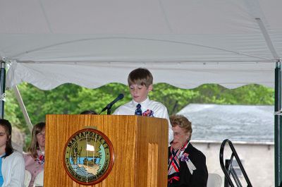 Mattapoisett Birthday Bash
Teddy Kassabian of ORR Junior High School reads a portion of the "Act of Incorporation" during Mattapoisett's 150th Birthday Celebration held on Sunday, May 20, 2007 outside Town Hall. (Photo by Tim Smith).
