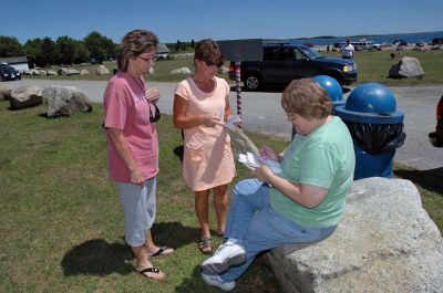 Treasure Hunters
Mattapoisett's 150th Sesquicentennial Celebration "Treasure Hunt" was held on Saturday, August 11 started in Shipyard Park and led participants to various landmarks throughout town. (Photo by Tim Smith).
