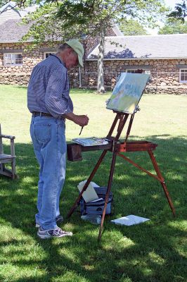 Arts in the Park
Marion artist Charles Parsons painted a portrait of Mattapoisett Library Director and musician Judy Wallace as she performed during the recent "Arts in the Park" benefit to raise money for furnishings in the new Mattapoisett Public Library which was held on Sunday, June 24 in Shipyard Park in Mattapoisett. (Photo by Robert Chiarito).
