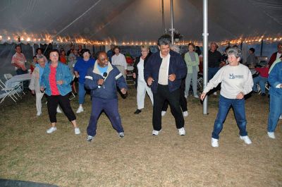 150th Block Party
Mattapoisett's 150th Sesquicentennial Celebration "Block Party" was held on Friday night, August 10 in Shipyard Park under the tent, despite inclement weather. (Photo by Tim Smith).
