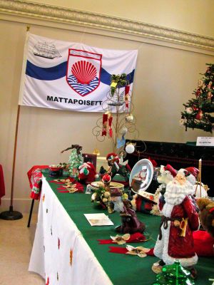 Making Mattapoisett Merry
The Mattapoisett Congregational Church hosted its annual "Village Country Store" holiday fair on Saturday, November 11. Here holiday decorations of all kind are on display, along with the town's signature flag. (Photo by Robert Chiarito).
