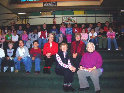 Church Donates Books
The steering committee of the Mattapoisett Congregational Church recently made a donation of books to first graders of the Hayden-McFadden Elementary School in New Bedford. The members of the church sought to give the gift of a book to each child in a single class at the north-side New Bedford school in an effort to promote the schools literacy program.
