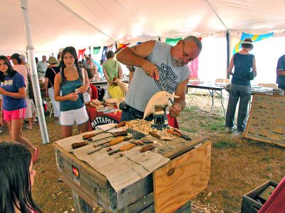 Celebrating Diversity
Hand-carved wooden birds was just one of the crafts on hand during Mattapoisett's Cultural Diversity Day held in Shipyard Park on Tuesday, August 7 as part of the town's weeklong slate of sesquicentennial events. (Photo by Kenneth J. Souza).

