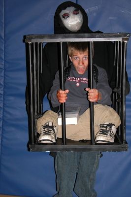 Mattapoisett Halloween Parade 2007
First Place winner in the Grade 5 and 6 category was Kyler Berry as a man in a cage. (Photo by Deborah Silva).
