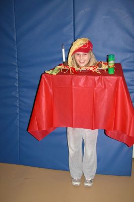 Mattapoisett Halloween Parade 2007
First Place winner in the Grade 3 and 4 category was Jane Kassabian as an Italian dinner table. (Photo by Deborah Silva).
