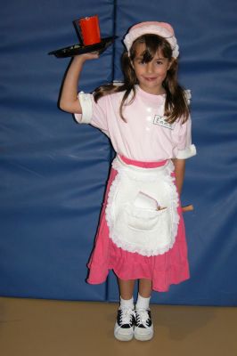 Mattapoisett Halloween Parade 2007
Third Place winner in the Grade 1 and 2 category was Emma Knox as drive-in waitress. (Photo by Deborah Silva).
