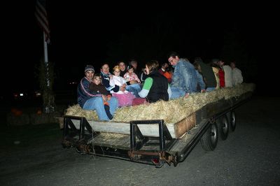 Halloween Hayride
The Mattapoisett YMCA treated families to a night of old-fashioned fun as they hosted a Halloween Hayride on Friday night, October 26 at Camp Massasoit. The event included games such as bobbing for donuts, witch hat ring toss, and pumpkin bowling. (Photo by Robert Chiarito).
