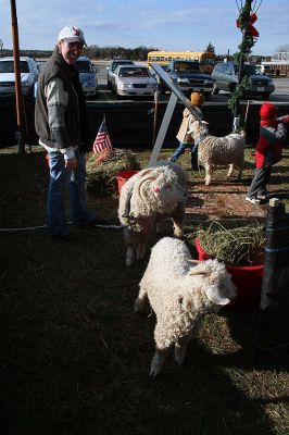 Holiday in the Park
A new attraction this year during Mattapoisett's Annual Holiday in the Park held on Saturday, December 6, 2008 in Shipyard Park was a petting zoo with furry, friendly livestock. (Photo by Robert Chiarito).
