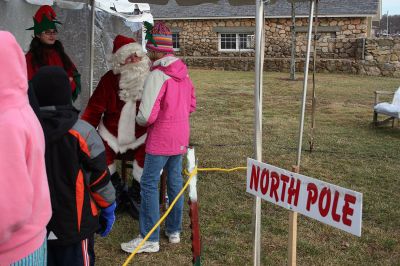 Holiday in the Park
Santa stopped by to listen patiently to everyone's wish lists during Mattapoisett's Annual Holiday in the Park held on Saturday, December 6, 2008 in Shipyard Park. (Photo by Robert Chiarito).
