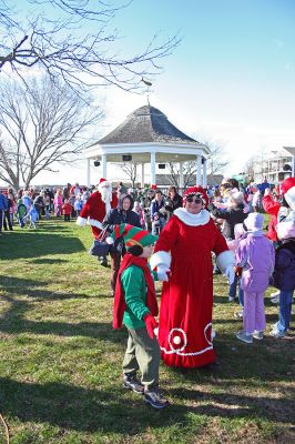 Holiday in the Park 2007
Mrs. Claus and Santa's helper make their way through Shipyard Park during Mattapoisett's annual "Holiday in the Park" celebration on Saturday, December 1, 2007 which drew a record crowd to the seasonal seaside event. (Photo by Robert Chiarito).
