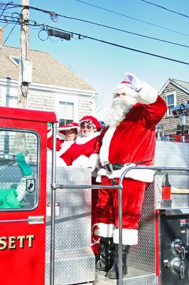 Holiday in the Park 2007
Santa arrives by fire truck for Mattapoisett's annual "Holiday in the Park" celebration which was held in Shipyard Park on Saturday, December 1, 2007 and drew a record crowd to the seasonal seaside event. (Photo by Robert Chiarito).
