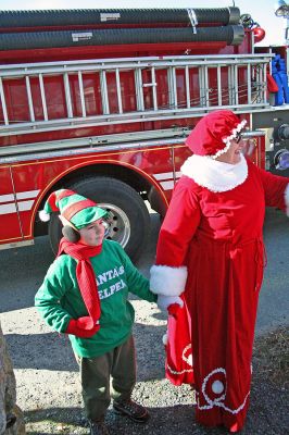 Holiday in the Park 2007
Mrs. Claus and one of Santa's helpers arrives for Mattapoisett's annual "Holiday in the Park" celebration which was held in Shipyard Park on Saturday, December 1, 2007 and drew a record crowd to the seasonal seaside event. (Photo by Robert Chiarito).
