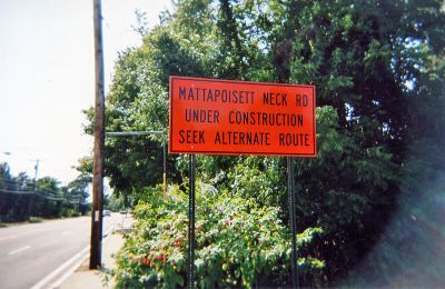Alternate Route?
While work proceeds on Mattapoisett Neck Road in Mattapoisett, a sharp-eyed reader caught this detour sign which has since been altered to hide the seek alternate route portion ... and with good reason. Wed like to challenge our readers to provide us with a possible alternate route to access Mattapoisett Neck for a chance to win a prize. Well also publish the most creative and/or amusing suggestion in a future edition.
