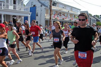 2007 Mattapoisett July 4 Road Race
Some of the nearly 1,000 runners who began the five-mile trek from the starting line at Shipyard Park in the 37th running of Mattapoisett's Annual July 4 Road Race. (Photo by Kenneth J. Souza).
