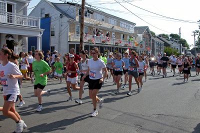 2007 Mattapoisett July 4 Road Race
Some of the nearly 1,000 runners who began the five-mile trek from the starting line at Shipyard Park in the 37th running of Mattapoisett's Annual July 4 Road Race. (Photo by Kenneth J. Souza).

