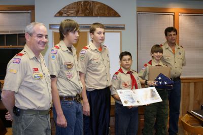 Salute to Scouts
Members of Mattapoisett Boy Scout Troop 53 were recently commended by the Mattapoisett Board of Selectmen for their ongoing collection efforts in support of Cape Cod Cares for the Troops. The troop was given a citation from the U.S. Air Force along with an American flag that was flown over Kuwait. Pictured here during the Selectmens meeting are (from left) Scoutmaster Ron Ellis, Bryan Buckley, Alex Buckley, Kyle Boyle, Haakon Perkins, and Assistant Scoutmaster Matt Buckley. (Photo by Kenneth J. Souza).

