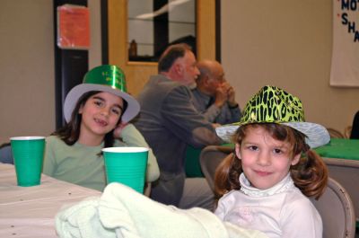 Potluck o' the Irish
Saint Anthony's Church in Mattapoisett held a friendly celebration in honor of Saint Patrick's Day with a potluck dinner and sing-along. Visitors were also welcomed into the churchs fellowship hall by the sounds of Brendan Begleys bagpipes, the singing of traditional Irish songs, and a performance Celtic dancing. (Photo by Robert Chiarito).
