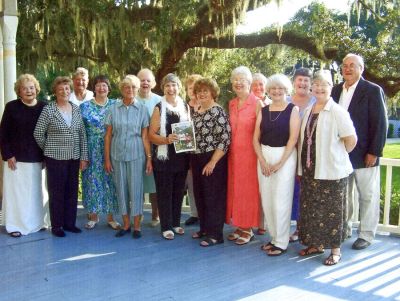 Mattapoisett Touring Club
Members of the Mattapoisett Touring Club pose with a copy of The Wanderer during a recent trip to Georgia and South Carolina. Here they are seen at the scenic Plantation Gardens. (Photo courtesy of Kay and Paul Levine).
