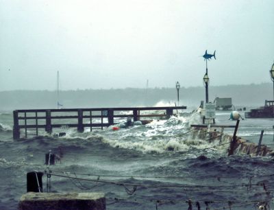 Stormy Weather
Rain and heavy winds pounded the tri-town area on Saturday and Sunday, October 28 and 29, causing damage to some homes and grounding several boats that were anchored in Mattapoisett Harbor. The estimated 50-mile-per-hour winds also sent waves crashing onto the Mattapoisett Town Wharf. (Photo by John Gibb).
