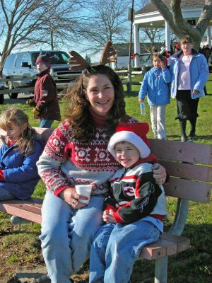 Mattapoisett Holiday Village Stroll 2006
The Town of Mattapoisett celebrated their first annual Holiday Village Stroll on Saturday, December 2 at various venues in and around Shipyard Park. The event included a visit from Santa Claus, Mrs. Claus, and friends, along with the traditional town tree lighting ceremony. (Photo by Robert Chiarito).
