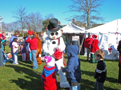Look at Frosty Go!
The Town of Mattapoisett celebrated their first annual Holiday Village Stroll on Saturday, December 2 at various venues in and around Shipyard Park. The event included a visit from Santa Claus, Mrs. Claus, and friends, along with the traditional town tree lighting ceremony. (Photo by Robert Chiarito).
