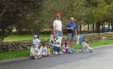 Mom's Marathon '07
An estimated 400 runners and walkers came out to the Oxford Creamery in Mattapoisett on Sunday, May 13 to participate in the first annual Tiara Classic Mothers Day 5K Road Race. The race was held to benefit the Womens Fund of Southeastern Massachusetts. Many of the runners donned tiaras and capes, making this event one of the more colorful local road races. (Photo by Robert Chiarito).
