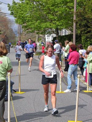 Mom's Marathon '07
An estimated 400 runners and walkers came out to the Oxford Creamery in Mattapoisett on Sunday, May 13 to participate in the first annual Tiara Classic Mothers Day 5K Road Race. The race was held to benefit the Womens Fund of Southeastern Massachusetts. Many of the runners donned tiaras and capes, making this event one of the more colorful local road races. (Photo by Robert Chiarito).
