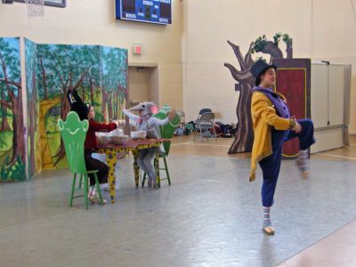 Alice at Center School
Members of the talented New Bedford Youth Ballet troupe dropped by Center School in Mattapoisett on Tuesday morning, March 13 to perform their version of Alice in Wonderland for both students and members of the Mattapoisett Council on Aging (COA). The show featured all the well-loved characters from the classic story dancing up a storm including the Mad Hatter, the Cheshire Cat, and the elusive White Rabbit. (Photo by Kenneth J. Souza).
