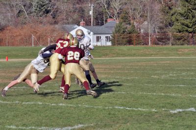 Cougar Classic
Seniors Joe Fasano and Ryan Midwood take down one of Tri-County's players during the big "Cougar Classic" game held on November 22 at Old Colony Regional Voke which ended in a heart-breaking shutout, 21-0. (Photo by Robert Chiarito).
