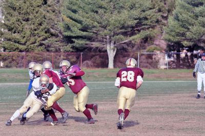 Cougar Classic
Seniors Matt Cunha and Ryan Midwood attempt to divert Tri-County's latest play during the big "Cougar Classic" game held on November 22 at Old Colony Regional Voke which ended in a heart-breaking shutout, 21-0. (Photo by Robert Chiarito).
