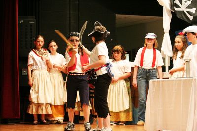 OHS Treasure Island
The Old Hammondtown School Drama Club presented a musical adaptation of the classic Robert Louis Stevenson tale, Treasure Island, on Thursday evening, April 17 before an audience of several hundred people in the Mattapoisett schools auditorium. The show was directed by ORR High School student Chelsie Nectow, who recently starred in the ORR Drama Clubs production of Evita, and featured over 50 Old Hammondtown students. (Photo by Robert Chiarito).
