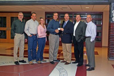 Booster Club Gets Boost
Kevin Cassidy, Treasurer of the Rochester Road Race; Mark Davis, Plant Manager, Covanta/SEMASS; Patti OHara, MSP Program Coordinator, Covanta/SEMASS; Jim Brown; Scott Muller, President of the Rochester Road Race; Travis VanHall, Director of Operations, Rochester Road Race; and Chuck Kantner, Vice President of the Rochester Road Race recently presented a donation in the amount of $2,006 to the ORR Booster Club from proceeds raised through the first annual run through Rochester held this past summer.
