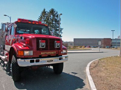 ORR Bomb Scare
A unit from the Mattapoisett Fire Department guards the main entrance to Old Rochester Regional High School during a bomb threat which forced the evacuation of the school on Monday morning, April 9. Students were bused to Tabor Academy in nearby Marion while the threat was investigated. (Photo by Kenneth J. Souza).
