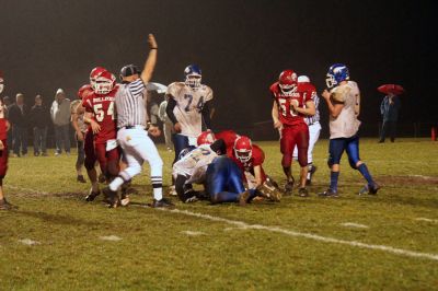 Football in the Fog
On a foggy night where it was difficult to see across the field, members of Old Rochester Regional High Schools Bulldog football team faced off against the Wareham Vikings on ORRs home turf. The competitive November 14 game ended up being an important win for the Bulldogs, 23-22. (Photo by Robert Chiarito).
