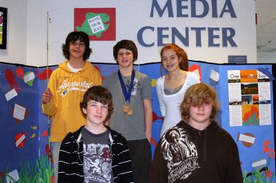 Making Waves
Five of the students who helped create the Save the Bay display inside the entrance to ORR Junior High School are shown in front of the display. Front row, left to right: Andrew Cardwell and David Dalton. Back row, left to right: Evan Botello, Max Medina, Michaela Riggi. (Photo by Sarah Taylor)
