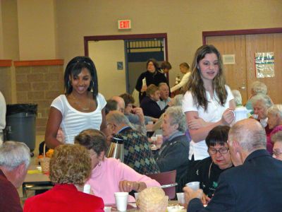 ORR Senior Thanksgiving 2006
Members of the eighth grade class at Old Rochester Regional Junior High School held their sixteenth annual Thanksgiving Banquet for tri-town senior citizens on Sunday, November 19. With help from the schools faculty and volunteers from the schools food services department, the students offered a homemade Thanksgiving meal to over 300 seniors from Mattapoisett, Marion and Rochester with free tickets distributed through the towns Councils on Aging. (Photo by Robert Chiarito).
