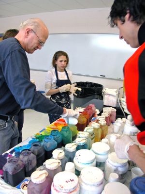 Tie-Dyed at ORR
Students in Ms. Gauvins eighth grade science class at Old Rochester Regional Junior High School learned about chemical reactions and colors during a tie-dye shirt-making session held this past week. UMass Dartmouth Chemistry Professor Tobey Dills (right background) and members of the UMass Dartmouth Chemistry Club were on hand to supervise the proceedings. Each student made their own cotton tie-dyed shirt which they will wear to school as part of a planned Tie-Dyed Day. (Photo by Kenneth J. Souza).
