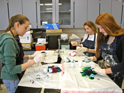 Tie-Dyed at ORR
Students in Ms. Gauvins eighth grade science class at Old Rochester Regional Junior High School learned about chemical reactions and colors during a tie-dye shirt-making session held this past week. UMass Dartmouth Chemistry Professor Tobey Dills (right background) and members of the UMass Dartmouth Chemistry Club were on hand to supervise the proceedings. Each student made their own cotton tie-dyed shirt which they will wear to school as part of a planned Tie-Dyed Day. (Photo by Kenneth J. Souza).
