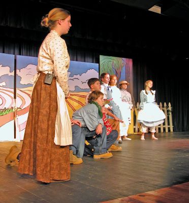 ORR Goes Oklahoma!
Members of the Drama Club at Old Rochester Regional Junior High School rehearse for their production of "G2K ... Oklahoma!" which is an adaptation of the classic musical which has been specifically designed for middle-school students. The production was staged at the school on November 8 and 9, 2006. (Photo by Kenneth J. Souza).
