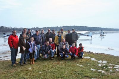 Frozen Flyers
Local Pilots Mike Dupont, Melinda Dupont, Mike Paganini, Roger Nodzo, Charlie Pickett, Joe Craig, James Melville, Ben Bailey, Michelle Bailey. Rob Hatch, Patrick Leroy, Steve Manchester, Bill Hunt, Barbara Hunt, Damian Frattasio and Steve Sperry gather each weekend to fly together to a chosen destination and swap stories over breakfast. On many of their excursions the pilots bring along their children to share the experience. (Photo by Robert Chiarito).
