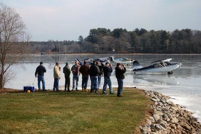 Frozen Flyers
A group of South Coast pilots recently took advantage of this winter's cold conditions to use Snipatuit Pond as a landing strip. The pilots use charts provided by the United States Government to determine if the thickness of the iceis enough tosupport the weight of their airplanes. Pilot Ben Bailey, who lives on the shores of the pond and hosted this past week's get together, flies a seaplane off of the pond during warmer weather months. (Photo by Robert Chiarito).
