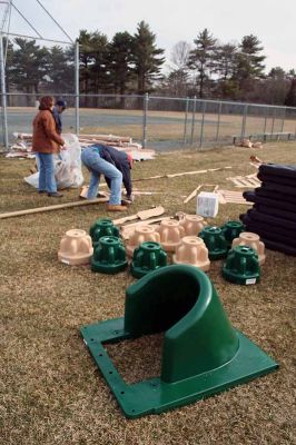 Playground Pals
An Army of volunteers descended on the Dexter Lane Sports Complex on Saturday, March 28 to build a much anticipated playground for the town of Rochester. The project is the result of a community wide fundraising effort spearheaded by Craig Davignon's 4th grade class at Rochester Memorial School over the last several years. (Photo by Robert Chiarito)
