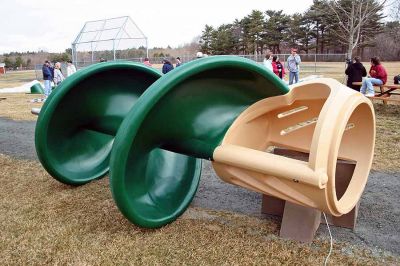 Playground Pals
An Army of volunteers descended on the Dexter Lane Sports Complex on Saturday, March 28 to build a much anticipated playground for the town of Rochester. The project is the result of a community wide fundraising effort spearheaded by Craig Davignon's 4th grade class at Rochester Memorial School over the last several years. (Photo by Robert Chiarito)
