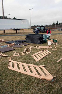 Playground Pals
An Army of volunteers descended on the Dexter Lane Sports Complex on Saturday, March 28 to build a much anticipated playground for the town of Rochester. The project is the result of a community wide fundraising effort spearheaded by Craig Davignon's 4th grade class at Rochester Memorial School over the last several years. (Photo by Robert Chiarito)
