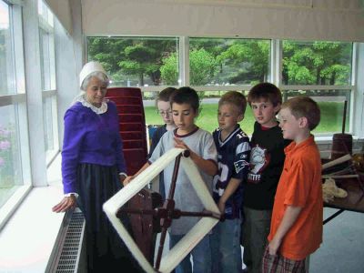 Learning From The Past
Third Grade students at Rochesters Memorial School recently got acquainted with Rochesters rich, historic past thanks to members of the Rochester Historical Commission. Students were treated to a hands-on experience with old toys, primitive household items and educational tools, and learned about early church customs, Rochesters Native Americans, and changes in the town boundaries as Marion, Mattapoisett, and Wareham eventually broke off from the large township of Rochester to form their own towns.
